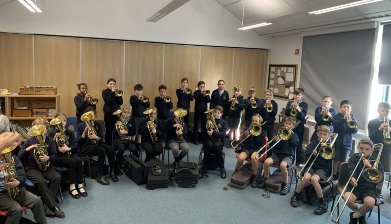 Year 6 Brass Group Rehearse For Performance