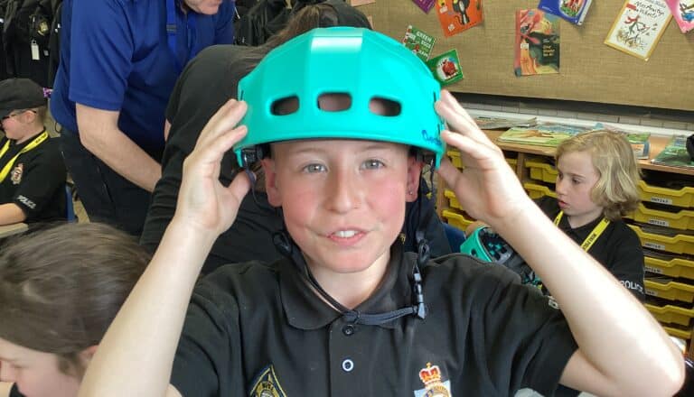 Mini-Police receive new helmets