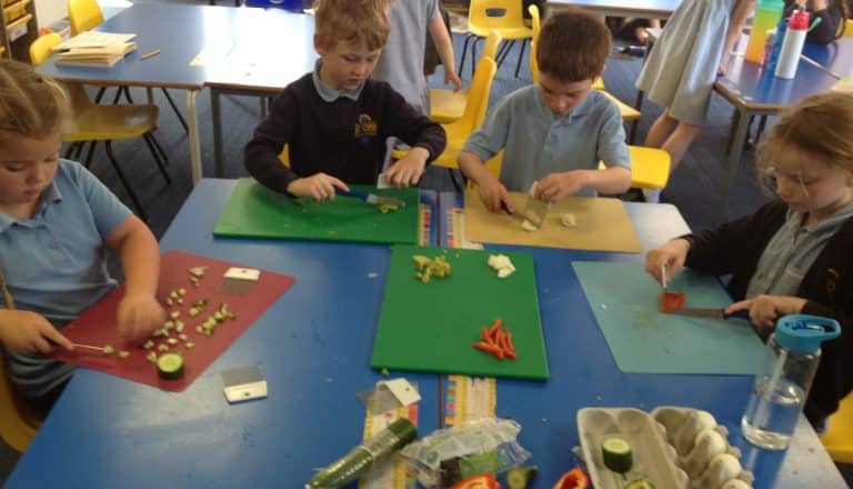 Year 2 practise their food preparation skills